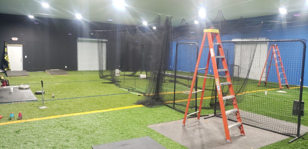 Newly built High School Indoor baseball facility with bright LED Lighting